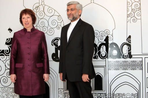 Iran's chief nuclear negotiator Saeed Jalili (R) poses with European Union's foreign policy chief Catherine Ashton before a meeting in the Iraqi capital Baghdad. World powers pressing Iran to scale back its nuclear programme Wednesday offered a new batch of incentives that fell short of the sanctions relief sought by Tehran, which made a counter-proposal