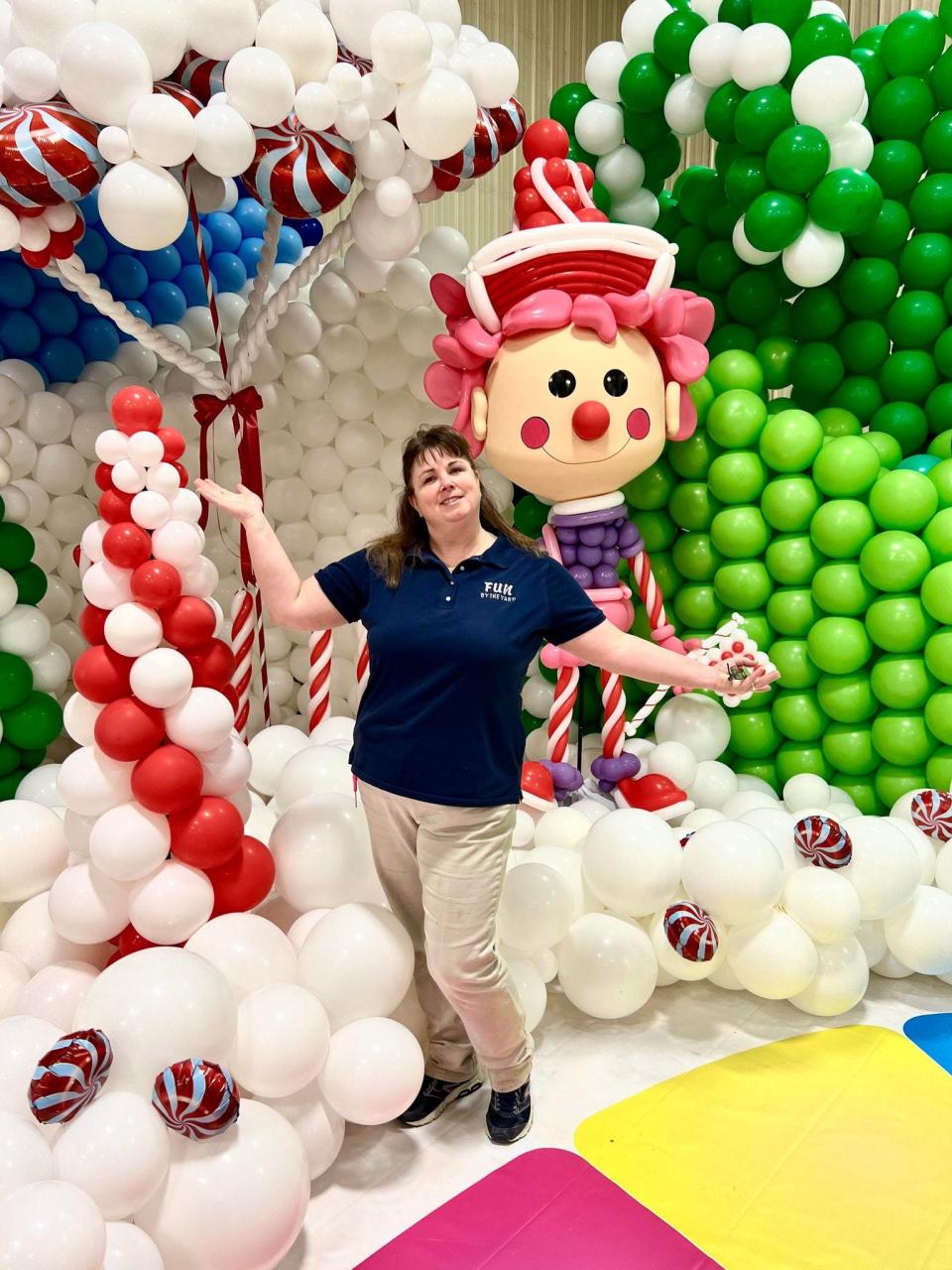 Fun by the Yard owner Jennifer Nyikos recently participated in a Big Balloon Build in Vincennes, Ind., to create a Candy Land-themed display to raise money for United Way of Knox County.