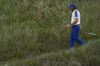 Team Europe's Tommy Fleetwood walks on the 18th hole during the Ryder Cup singles matches at the Whistling Straits Golf Course Sunday, Sept. 26, 2021, in Sheboygan, Wis. (AP Photo/Charlie Neibergall)
