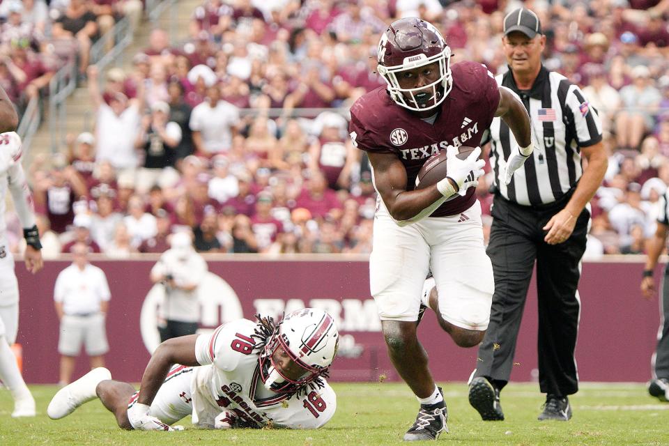 Oct 28, 2023; College Station, Texas, USA; Texas A&M Aggies running back Amari Daniels (4) runs against South Carolina Gamecocks during the second half at Kyle Field. Mandatory Credit: Dustin Safranek-USA TODAY Sports