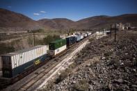 A train rumbles through the Tahoe Reno Industrial Center in McCarran, Nevada, September 16, 2014. REUTERS/Max Whittaker