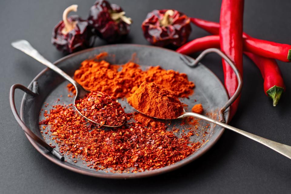 Spanish paprika and pepper powder shown in a dish