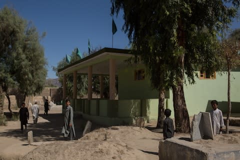 Mia Ali Saheb Shrine in Nangharhar, located in a graveyard, is a makeshift health facility for people struggling with mental illness - Credit: Stefanie Glinski