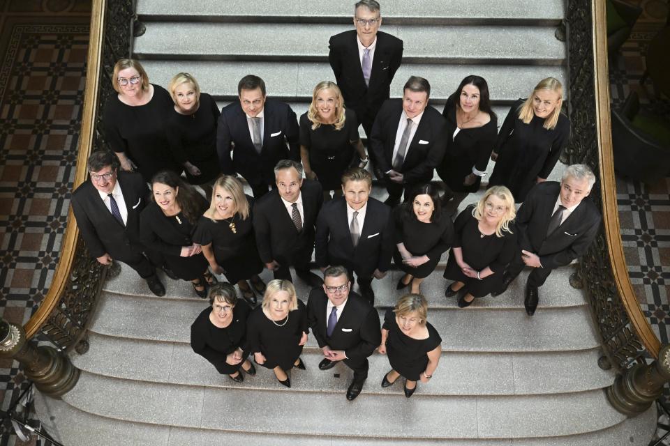 The new Government of Finland led by Prime Minister Petteri Orpo pose for a family picture in Helsinki, Finland on Tuesday, June 20, 2023. First row, from left, Minister of Agriculture and Forestry Sari Essayah, Minister of Finance Riikka Purra, Prime Minister Petteri Orpo and Minister of Education Anna-Maja Henriksson. Second row, from left, Minister of Labour (split into two-year posts) Arto Satonen, Minister for Local and Regional Government Anna-Kaisa Ikonen, Minister for Culture and Science (split into two-year posts) Sari Multala, Minister of the Environment and Climate Change Kai Mykk'nen, Minister of Defence Antti H'kk'nen, Minister for Social Security Sanni Grahn-Laasonen, Minister of Justice Leena Meri and Minister for Europe and Corporate Governance Anders Adlercreutz. Third row, from left, Minister of Social Affairs and Health Kaisa Juuso, Minister of the Interior Mari Rantanen, Minister of Economic Affairs (divided into two-year posts) Vilhelm Junnila, Minister for Sport, Physical Acticity and Youth (split between the SPP and CD for two-year posts) SPP's Sandra Bergqvist, Minister for Foreign Trade and Development Ville Tavio, Minister for Transport and Communications Lulu Ranne and Minister for Foreign Affairs Elina Valtonen. (Jussi Nukari/Lehtikuva via AP)