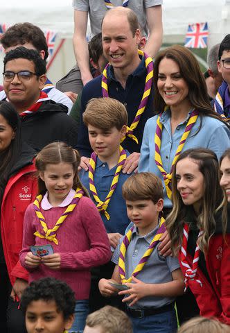 <p>Daniel Leal - WPA Pool/Getty</p> (Center, from left) Princess Charlotte, Prince George, Prince William, Kate Middleton and Prince Louis at a Big Help Out effort on May 8, 2023.