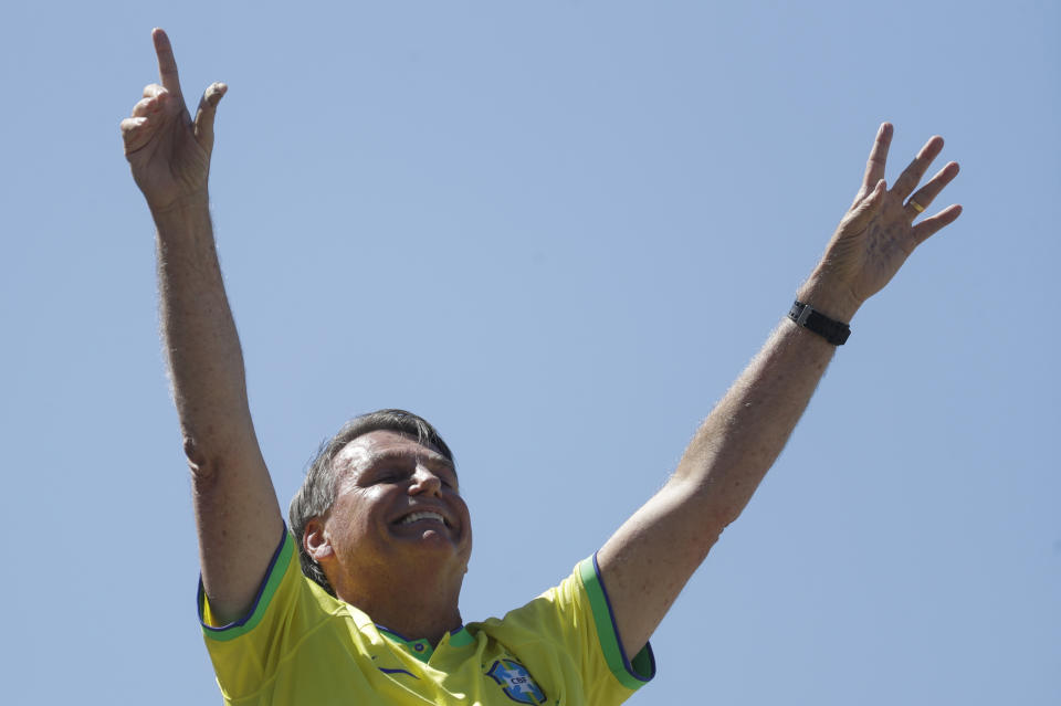 Brazil's former President Jair Bolsonaro gestures during a demonstration calling for freedom of expression, spurred by Brazilian court orders to suspend accounts on the social media platform X, in Copacabana beach, Rio de Janeiro, Brazil, Sunday, April 21, 2024. (AP Photo/Bruna Prado)