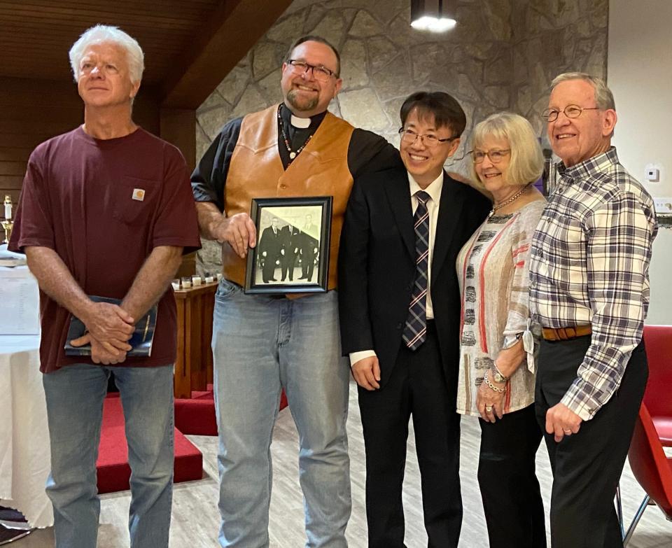 Don "Kirk" Martz, the Rev. Bo Ireland, the Rev. James Kim, and Carolyn and Jim Clark pose for a picture after the Clark Memorial United Methodist Church deconsecration service in Oklahoma City.