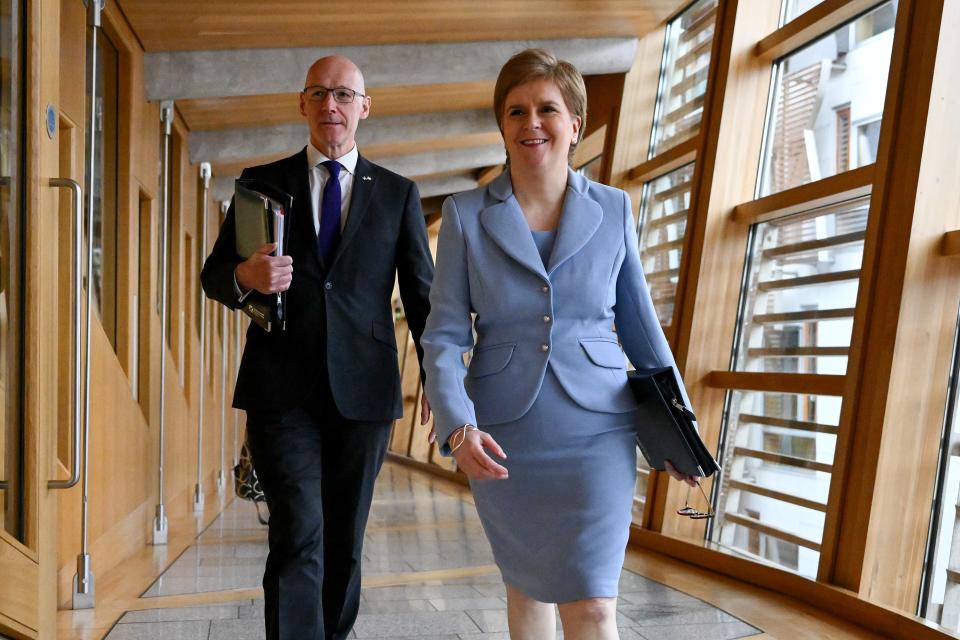 File: Scotland’s first minister Nicola Sturgeon with deputy first minister John Swinney in Edinburgh on 28 June 2022 (Getty Images)