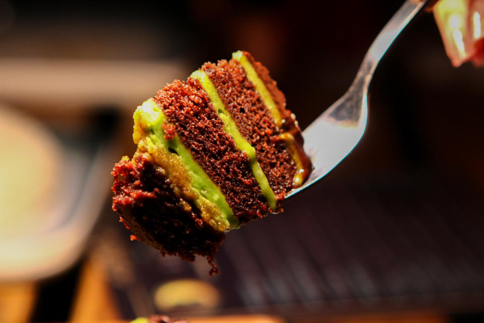 Close up of a slice of chocolate cake