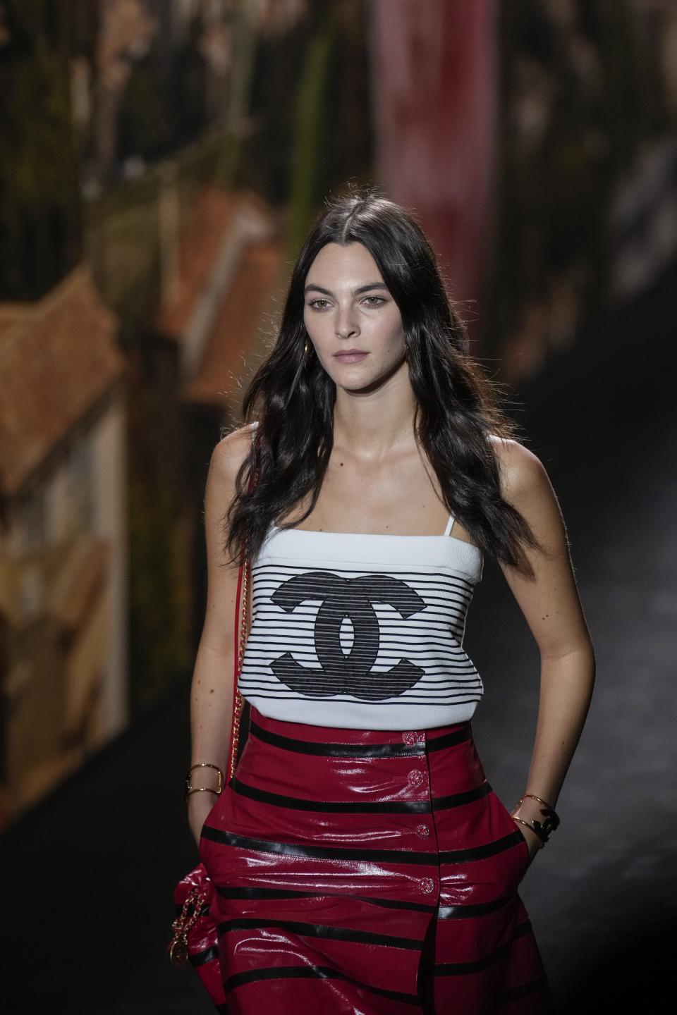 Vittoria Ceretti wears a creation for the Chanel Spring/Summer 2024 womenswear fashion collection presented Tuesday, Oct. 3, 2023 in Paris. (AP Photo/Christophe Ena)