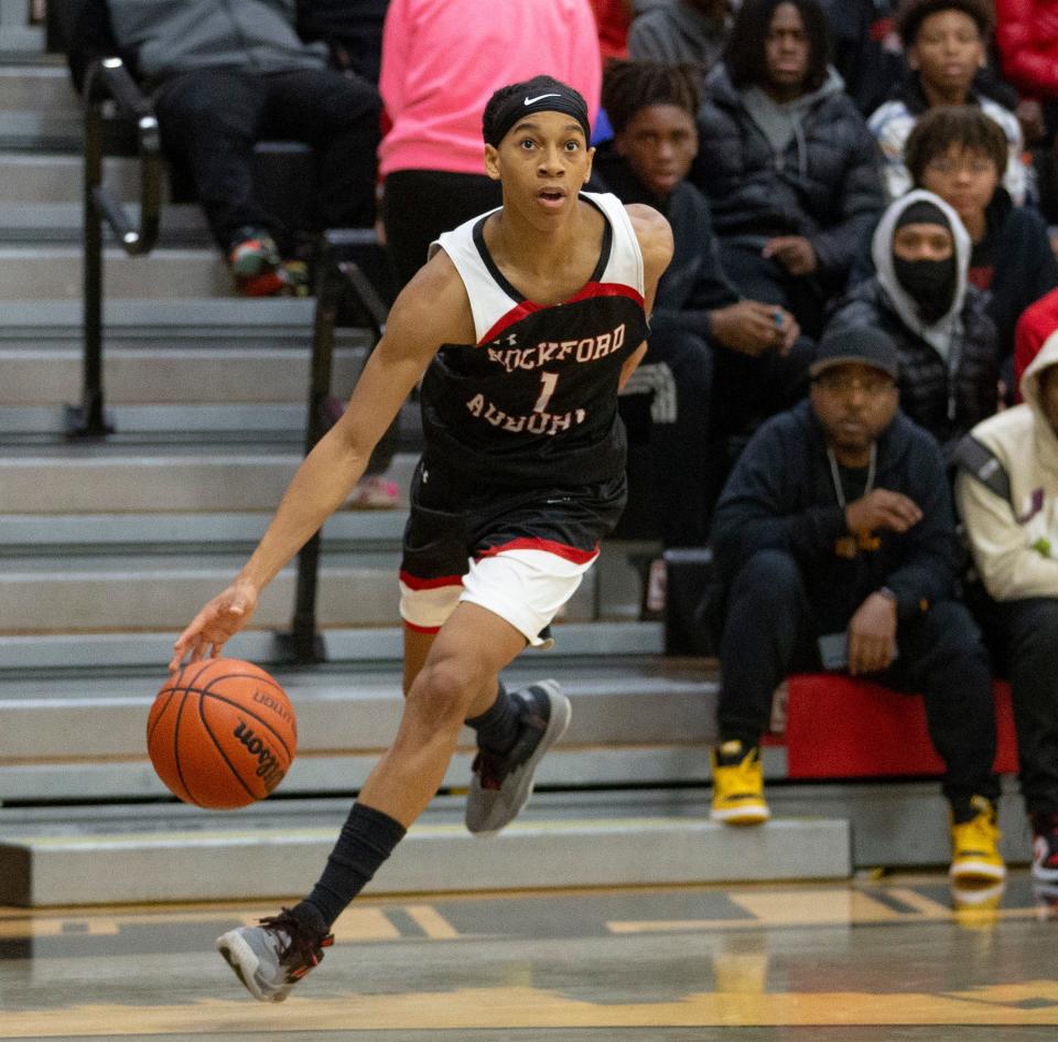 Auburn's Rakim Chaney, shown dribbling Nov. 26, 2022 in a game at Auburn, has overcome various leg injuries to lead Auburn to its first sectional title in seven years.