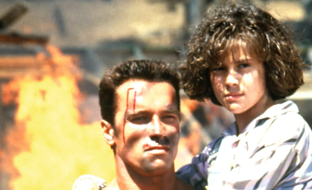 Schwarzenegger and Alyssa Milano in 'Commando' (Photo: 20th Century Fox Film Corp./Courtesy Everett Collection)