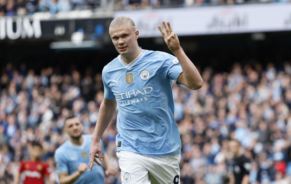 Manchester City's Erling Haaland celebrates scoring their third goal of the game during the English Premier League soccer match between Manchester City and Wolverhampton Wanderers at the Etihad Stadium in Manchester, England, Saturday, May 4, 2024. (Richard Sellers/PA via AP)