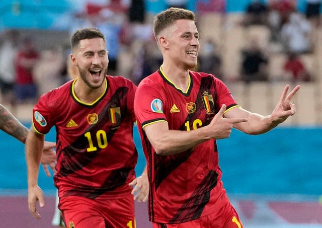Thorgan Hazard, right, celebrates with his brother Eden after opening the scoring for Belgium against Portugal 
