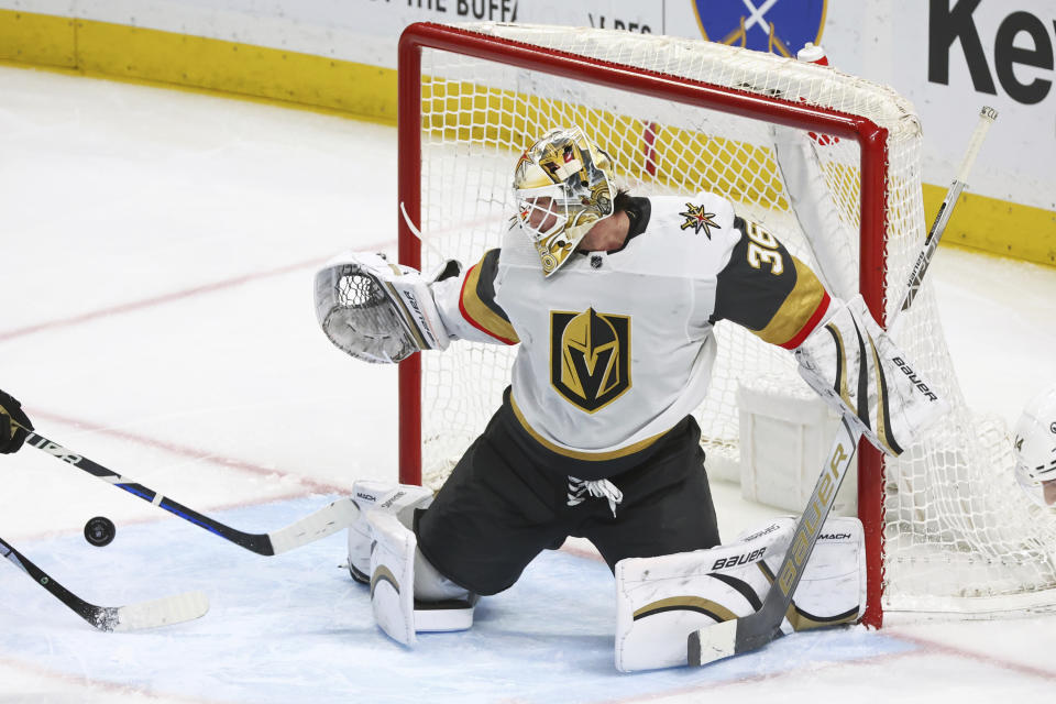 Vegas Golden Knights goaltender Logan Thompson (36) makes a pad save during the third period of an NHL hockey game against the Buffalo Sabres Saturday, March 2, 2024, in Buffalo, N.Y. (AP Photo/Jeffrey T. Barnes)