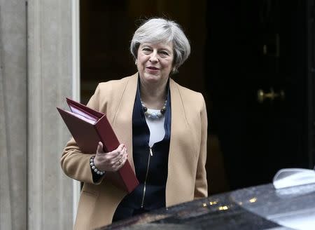 Britain's Prime Minister Theresa May leaves 10 Downing Street before Chancellor of the Exchequer Philip Hammond delivers his budget to the House of Commons in London, Britain March 8, 2017. REUTERS/Neil Hall