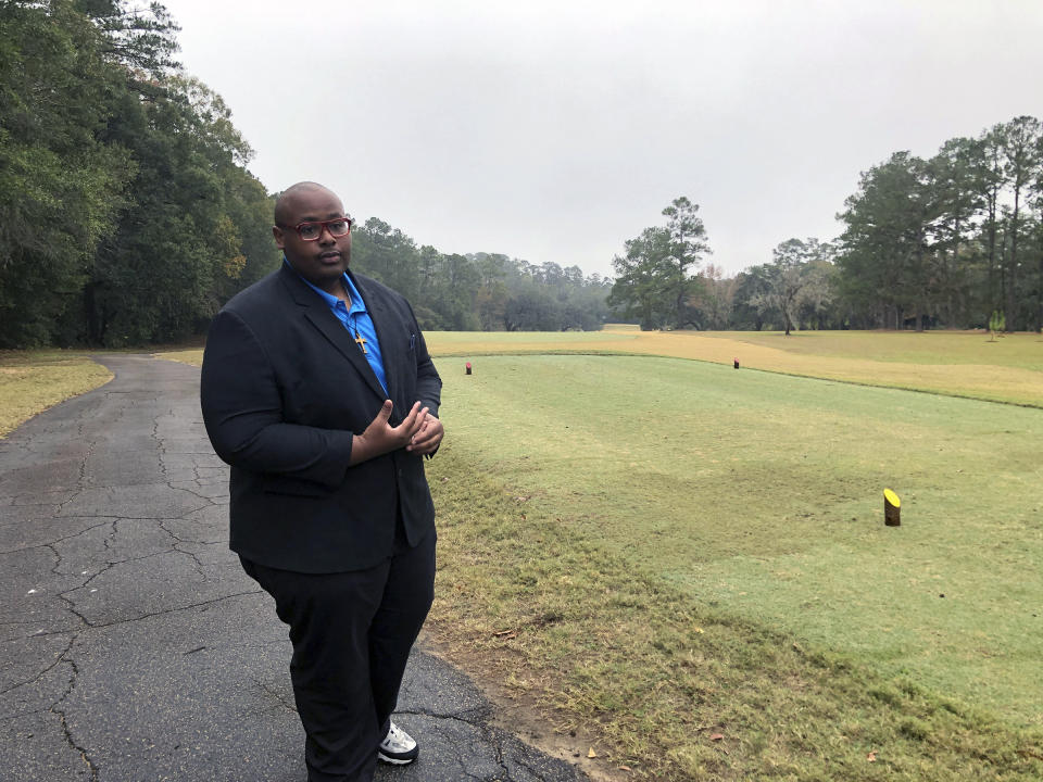 Delaitre Hollinger, the immediate past president of the Tallahassee branch of the NAACP, visits the Capital City Country Club in Tallahassee, Fla., on Dec. 17, 2019. The discovery this month of 40 graves _ with perhaps dozens more yet to be found _ has spawned discussion about how to dignify the souls who lay in eternal rest at the golf course. Hollinger says the slaves buried at the country club deserve to have their dignity restored. (AP Photo/Bobby Caina Calvan)