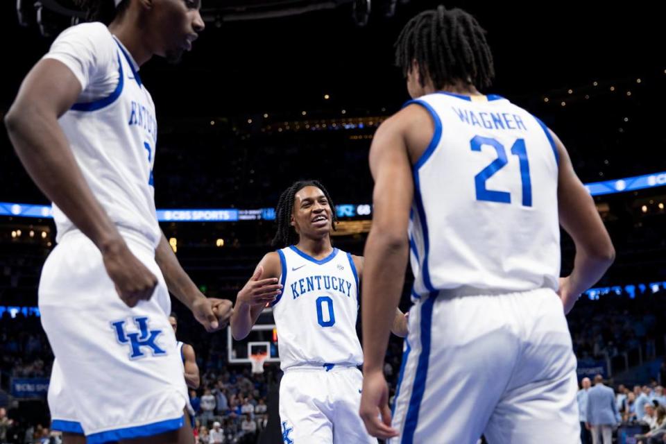 Kentucky’s Rob Dillingham (0) celebrates with D.J. Wagner (21) during a win earlier this season. The Wildcats have one game remaining before opening Southeastern Conference play on Jan. 6. Silas Walker/swalker@herald-leader.com