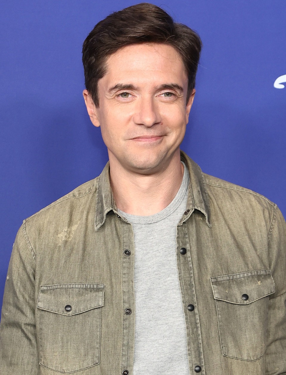 Topher Grace attends the 2022 ABC Disney Upfront at Basketball City in New York City