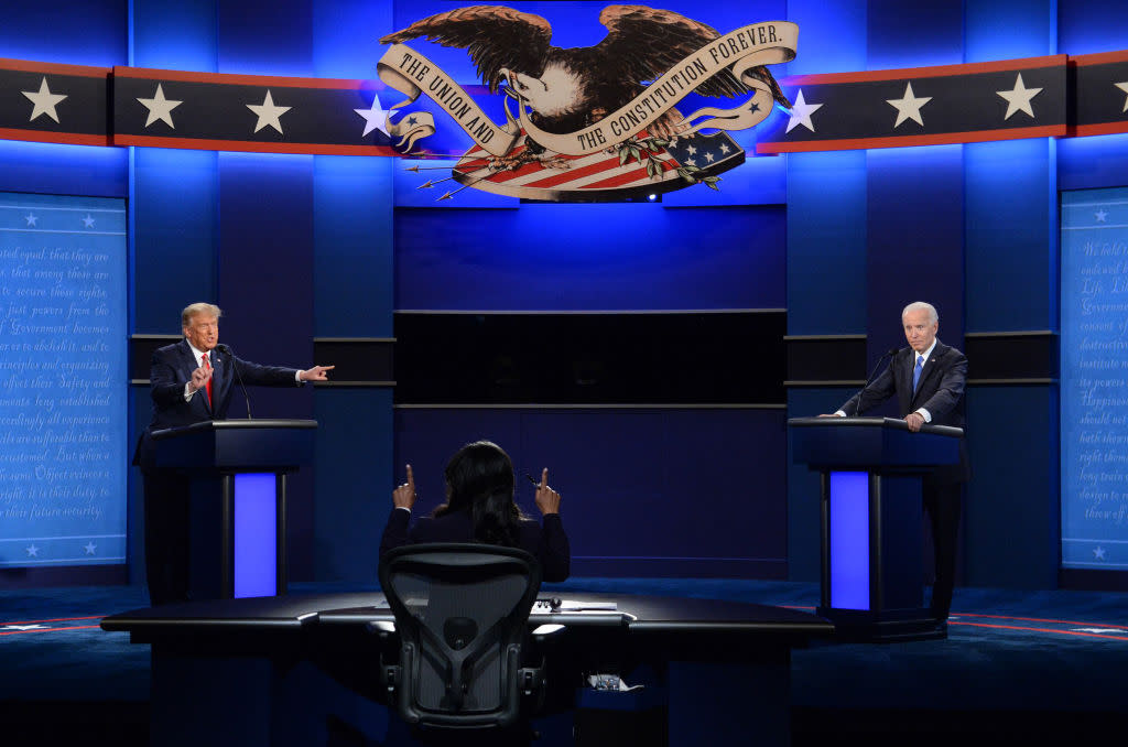  Donald Trump, left, speaks as Joe Biden, right, listens during a 2020 U.S. presidential debate. 