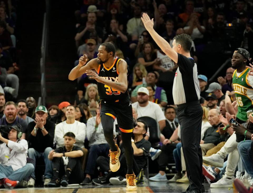 Phoenix Suns forward Kevin Durant (35) celebrates after a three point basket against the Minnesota Timberwolves during game 4 of the Western Conference first round series at Footprint Center on Sunday, April 28, 2024.