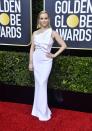 <p>The actress looked sleek and elegant in this Roland Mouret gown and Tiffany & Co. jewelry she wore to the 77th Annual Golden Globe Awards.</p>