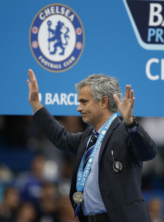 Chelsea's manager Jose Mourinho wears his Premier League winners' medal during the presentation at Stamford Bridge in London, on May 24, 2015