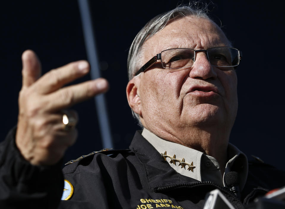 FILE - In this Jan. 9, 2013, file photo, Maricopa County Sheriff Joe Arpaio speaks with the media in Phoenix. Documents obtained by The Associated Press show a court-appointed investigator concluded that high-ranking managers for former metro Phoenix Sheriff Arpaio disregarded a federal judge's order to halt immigration sweeps targeting Latinos. (AP Photo/Ross D. Franklin, File)