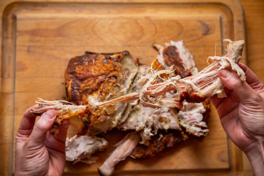 LOS ANGELES, CA - AUGUST 28: Fool-proof pulled pork, pulled by hand, but not before roasting the pork in the oven at high heat to brown/caramelize the outside, for 30-60 minutes, then reduce heat to 250 and cook until internal temp is 200 degrees, 10 to 14 hours, depending on size and weight of the cut, remove from oven, let rest until cool enough to touch with hands for serving, photographed at a Los Angeles, CA, home, Friday, Aug. 28, 2020. (Jay L. Clendenin / Los Angeles Times)