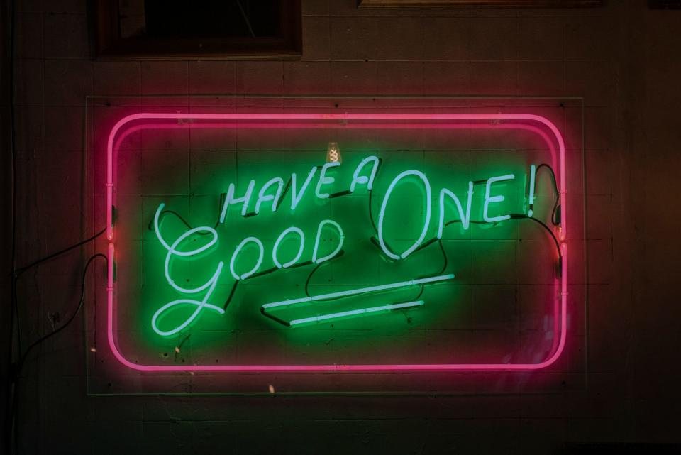 A neon sign inside Good Company urges Akron diners to "Have a Good One!"