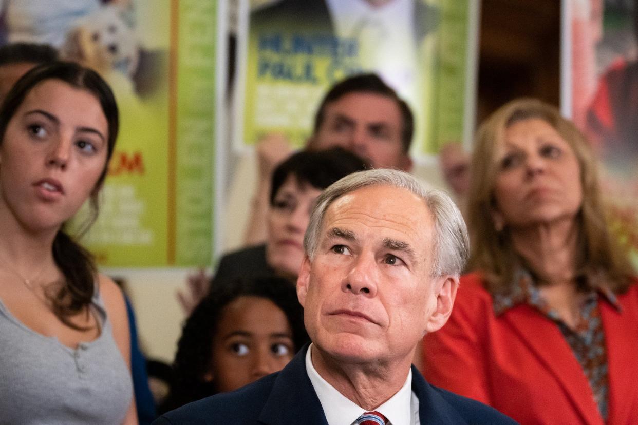 Governor Greg Abbott listens to questions from reporters at the Fighting the Fentanyl Crisis Bill Signing, June 14, at the Texas Capitol.
(Credit: Sara Diggins, AMERICAN-STATESMAN)