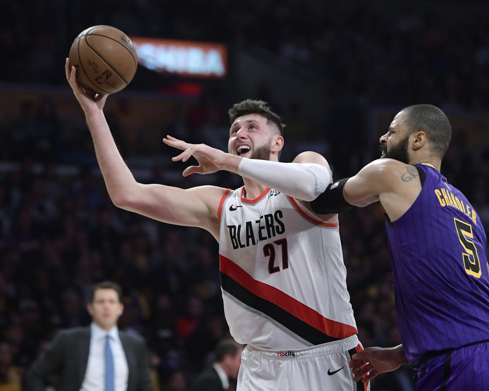 Portland Trail Blazers center Jusuf Nurkic, left, shoots as Los Angeles Lakers center Tyson Chandler defends during the first half of an NBA basketball game Wednesday, Nov. 14, 2018, in Los Angeles. (AP Photo/Mark J. Terrill)