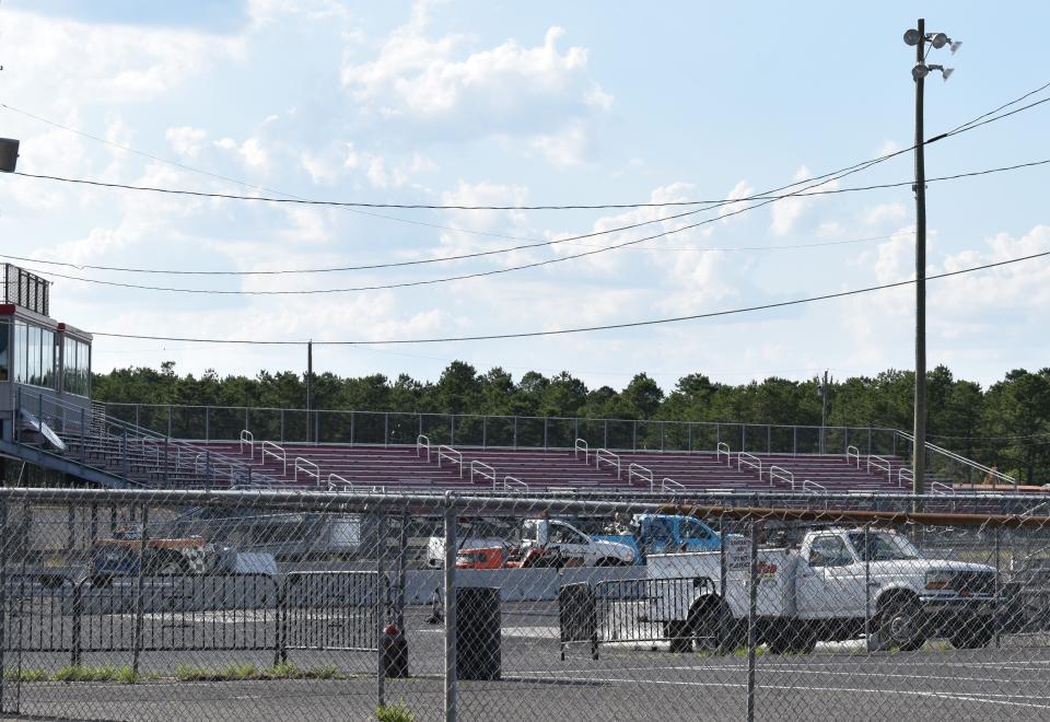 Bleachers rise above a quarter-mile racing strip at Atco Dragway in Waterford.
