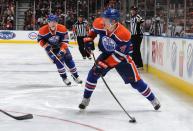 EDMONTON, CANADA - NOVEMBER 19: Taylor Hall #4 and Ryan Nugent-Hopkins #93 of the Edmonton Oilers break down the ice against the Chicago Blackhawks on November 19, 2011 at Rexall Place in Edmonton, Alberta, Canada. (Photo by Dale MacMillan/Getty Images)