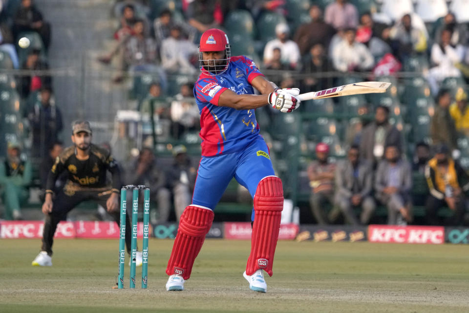 Karachi Kinds' Kieron Pollard plays a shot during the Pakistan Super League T20 cricket match between Peshawar Zalmi and Karachi Kinds, in Lahore, Pakistan Wednesday, Feb. 21, 2024. (AP Photo/K.M. Chaudary)