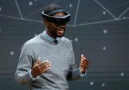 Taj Reid, Senior Designer at Microsoft wears a HoloLens VR headset at Microsoft's Windows 10 "Creators Update" live event in the Manhattan borough of New York City, October 26, 2016. REUTERS/Lucas Jackson