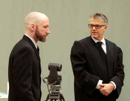 Anders Behring Breivik (L) and his lawyer Oystein Storrvik are pictured on the fourth day of the appeal case in Borgarting Court of Appeal at Telemark prison in Skien, Norway, January 13, 2017. NTB Scanpix/Lise Aaserud/via REUTERS