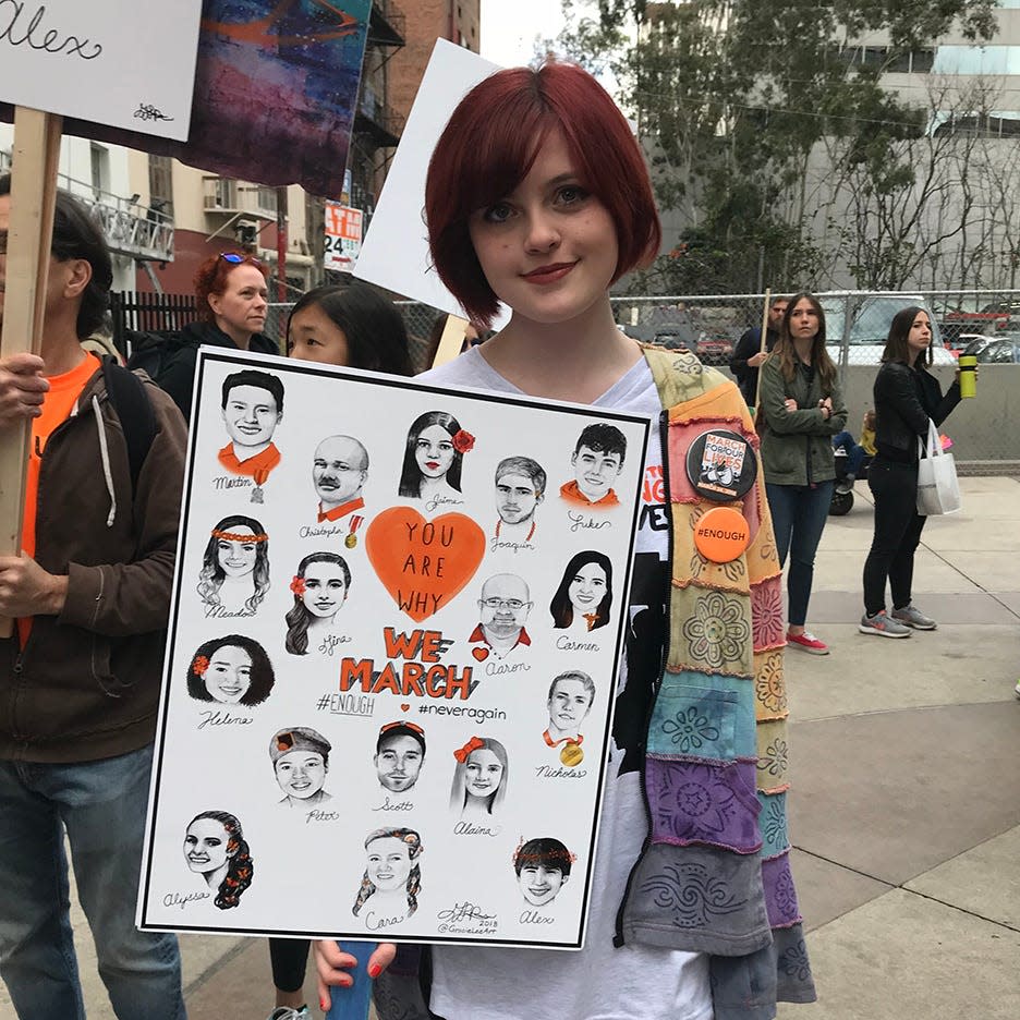 Gracie Pekrul drew portraits of victims and put them on signs for the March For Our Lives.