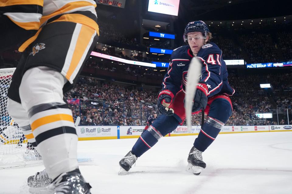 Columbus Blue Jackets center Hunter McKown (41) pursues the puck during the first period of the NHL hockey game against the Pittsburgh Penguins at Nationwide Arena on April 13, 2023.