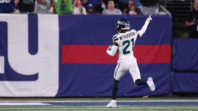 Rookie Devon Witherspoon scores on 97-yard pick-6 as Seahawks' defense  leads Seattle over Giants