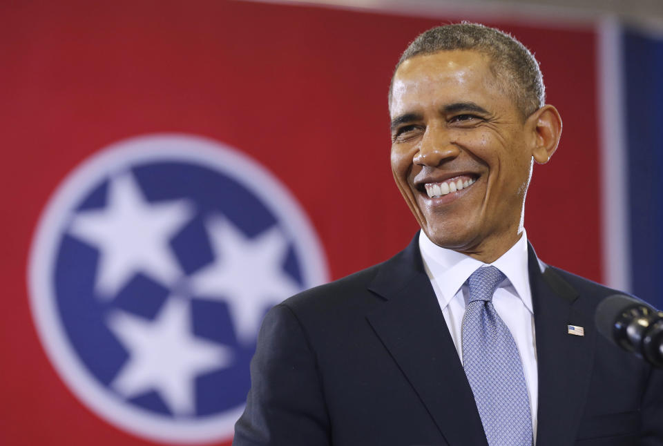 U.S. President Barack Obama smiles before he speaks at McGavock High School in Nashville