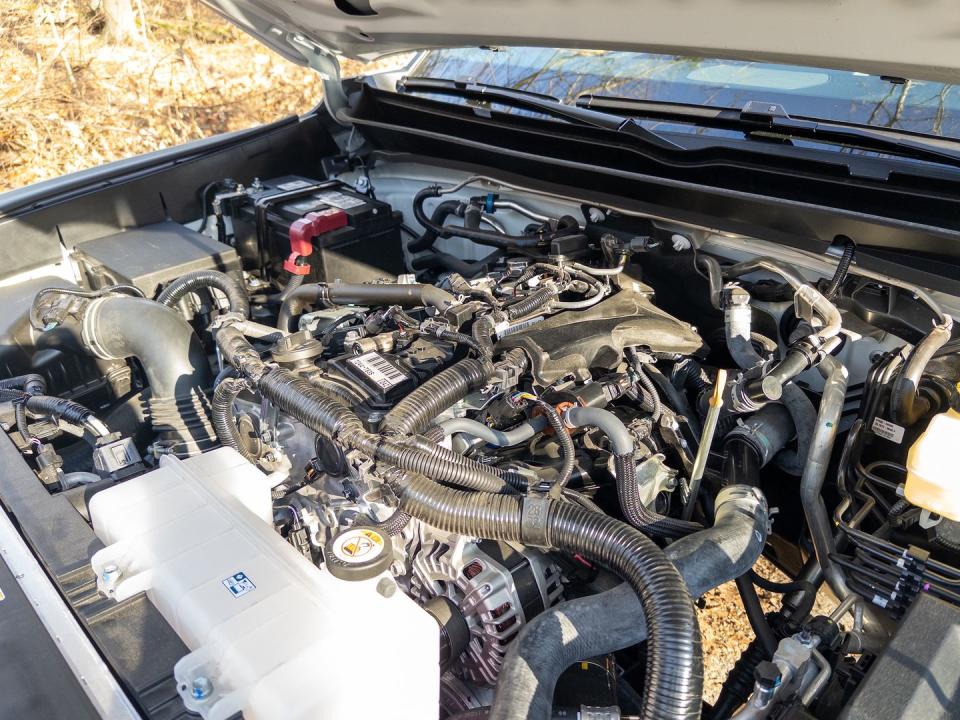 a car engine with its hood open