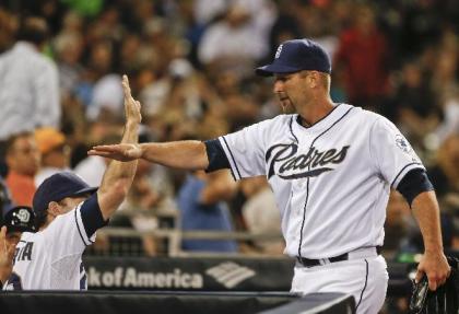 Lane high-fives teammates after making his first appearance in the majors since 2007. (AP)