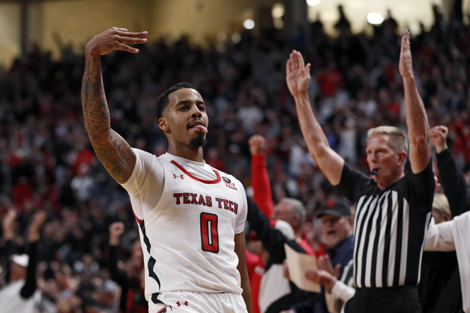 Texas Tech's Kyler Edwards (0) celebrates after scoring three points during the second half of an NCAA college basketball game against Iowa State, Saturday, Jan. 18, 2020, in Lubbock, Texas. (AP Photo/Brad Tollefson)