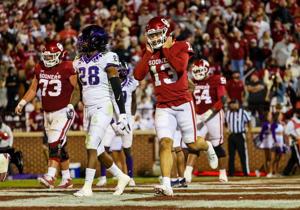 Oklahoma quarterback Caleb Williams (13) reacts after scoring a touchdown during the second half against TCU at Gaylord Family-Oklahoma Memorial Stadium.