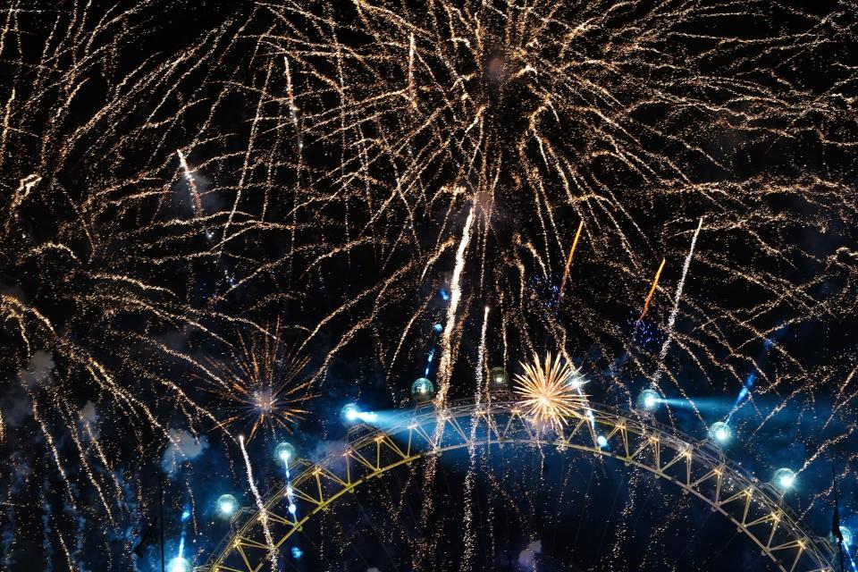 Fireworks light up the sky over the London Eye in central London during last year’s New Year celebrations (Victoria Jones/PA) (PA Archive)