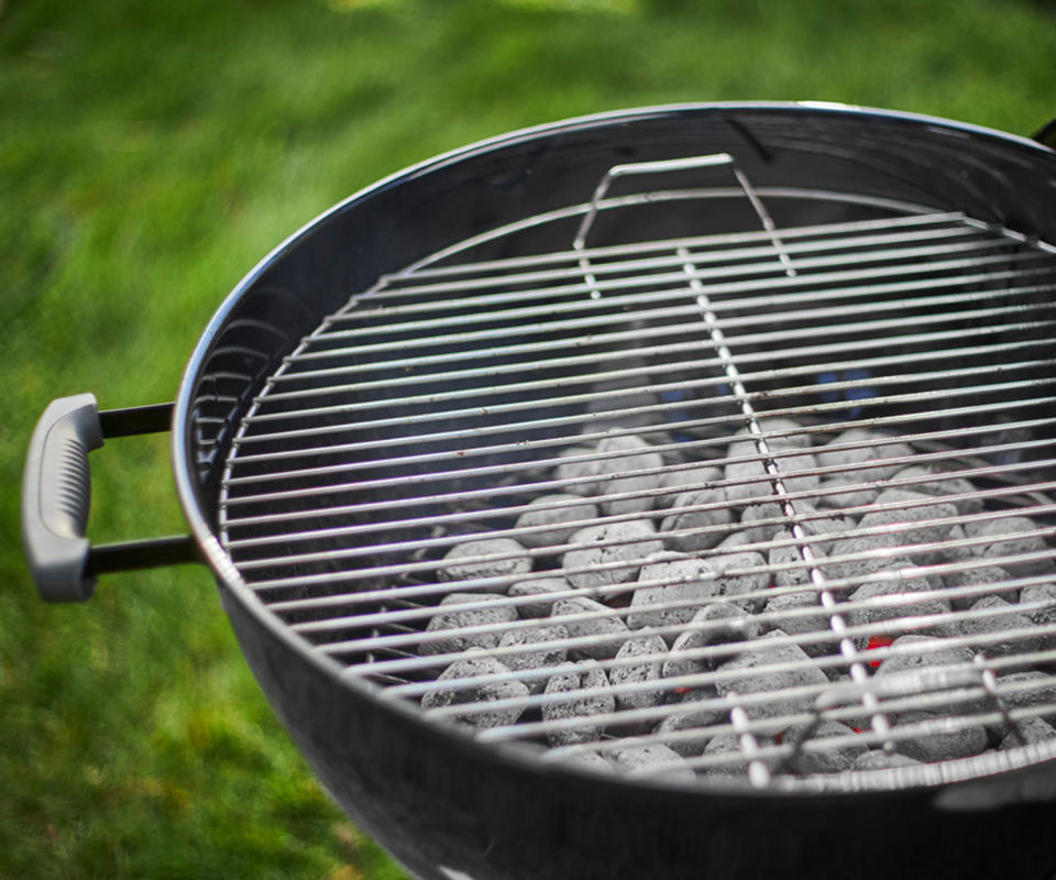 charcoal lit on a grill