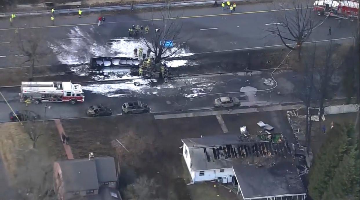 Emergency personnel respond to the scene of a tanker fire on Saturday, March 4, 2023 in Frederick, Md.  The driver of a tanker truck that overturned on on U.S. 15 in Frederick Saturday, sparking a large fire that damaged other vehicles and homes, has died but no other injuries or fatalities have been reported, authorities said.