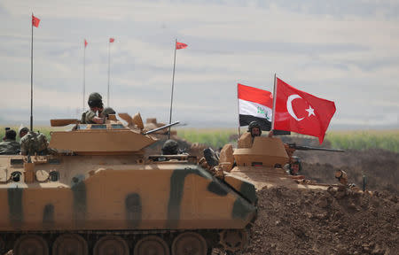 Turkish and Iraqi troops are pictured during a joint military exercise near the Turkish-Iraqi border in Silopi, Turkey, September 26, 2017. REUTERS/Umit Bektas