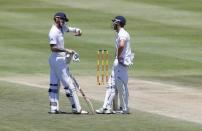 England's Alex Hales (left) dicusses tactics with Nick Compton during the second cricket test match against South Africa in Cape Town, South Africa, January 2, 2016. REUTERS/Mike Hutchings